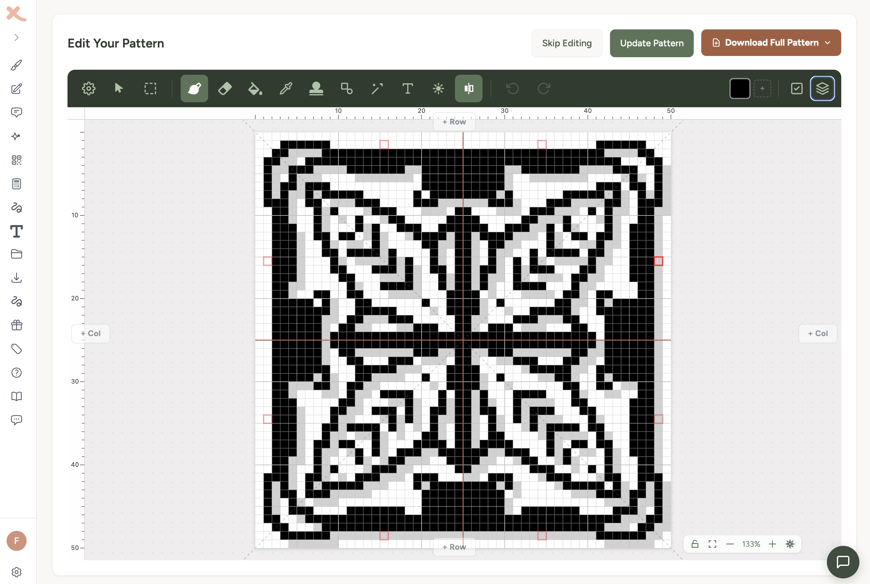 Cross stitch designer with symmetry mode showing a flower pattern